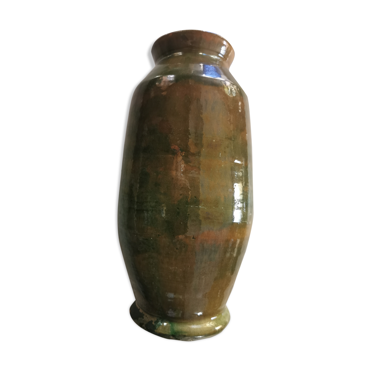 Ancient vase in glazed green terracotta.