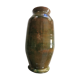 Ancient vase in glazed green terracotta.