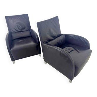 Pair of aubergine leather club armchairs by Cinna.