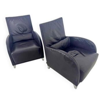 Pair of aubergine leather club armchairs by Cinna.