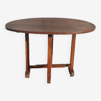 Ancienne table ovale rustique en bois repliable de ferme