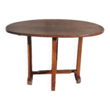 Old rustic oval folding wooden farmhouse table