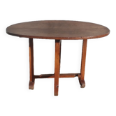 Old rustic oval folding wooden farmhouse table