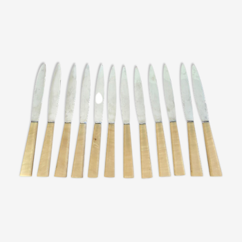 Series of 12 vintage table knives