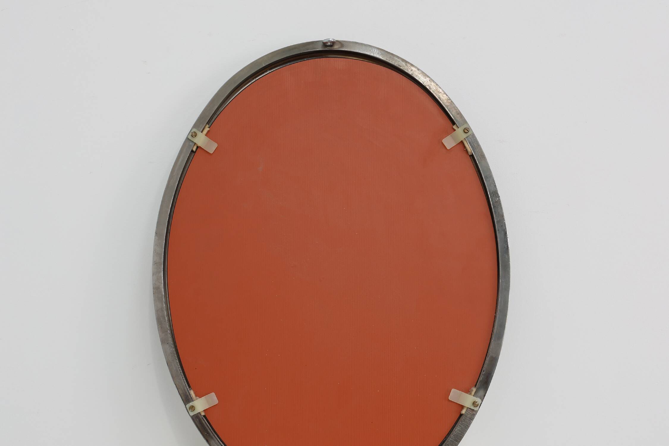 Miroir mural ovale chromé Art Déco, Belgique vers 1920