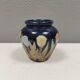 Small delicious blue ceramic vase with floral decoration. Sweden 1970s