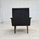 1970s, Danish armchair, black artificial leather, teak wood legs.