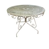 Old garden table in solid wrought iron