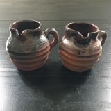 Pair of sandstone pitchers