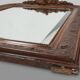 Louis Philippe mirror in plaster and wood with handcrafted decorations, France ca. 1900