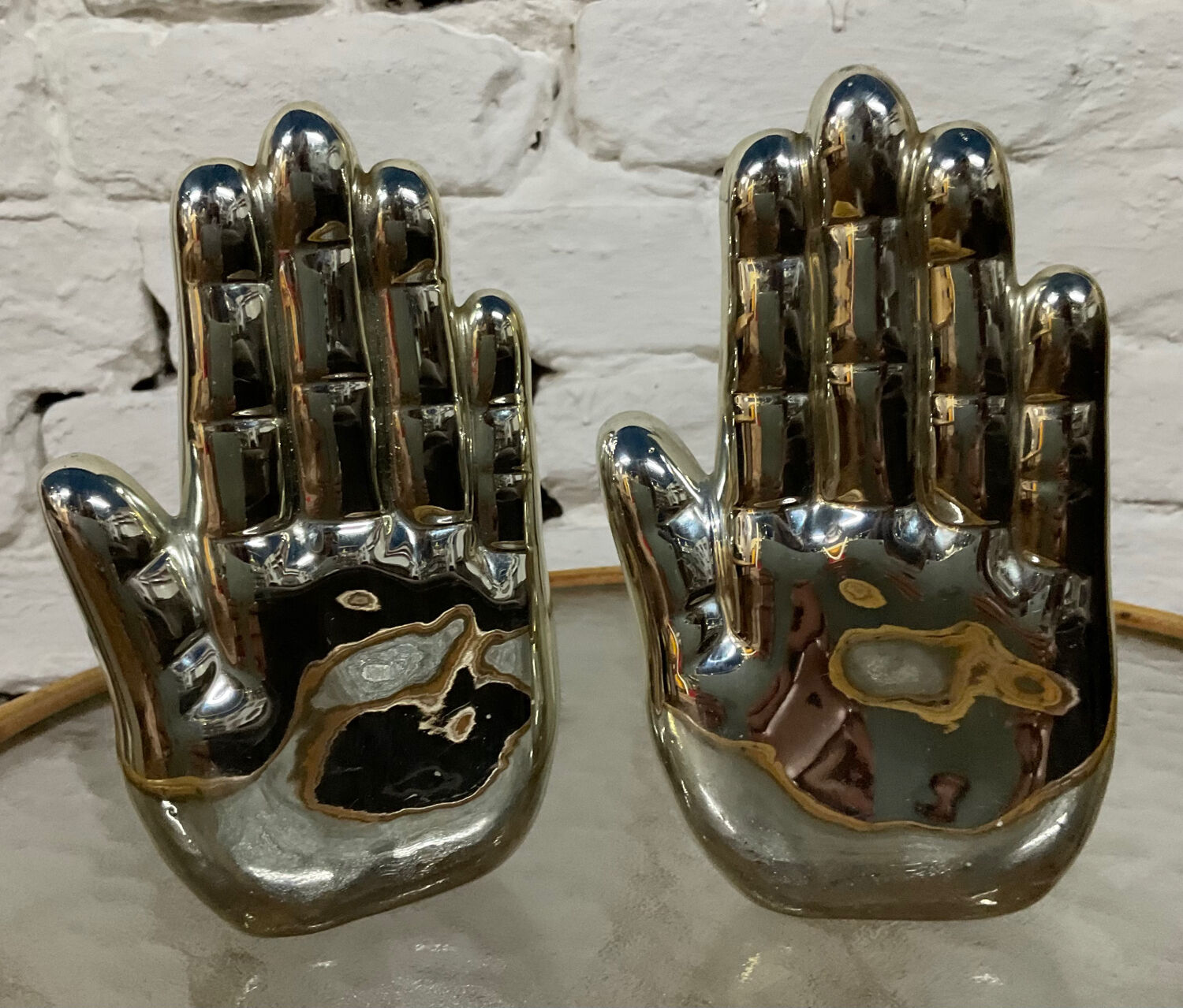 Pair of chrome ceramic hand bookends from the 70s and 80s