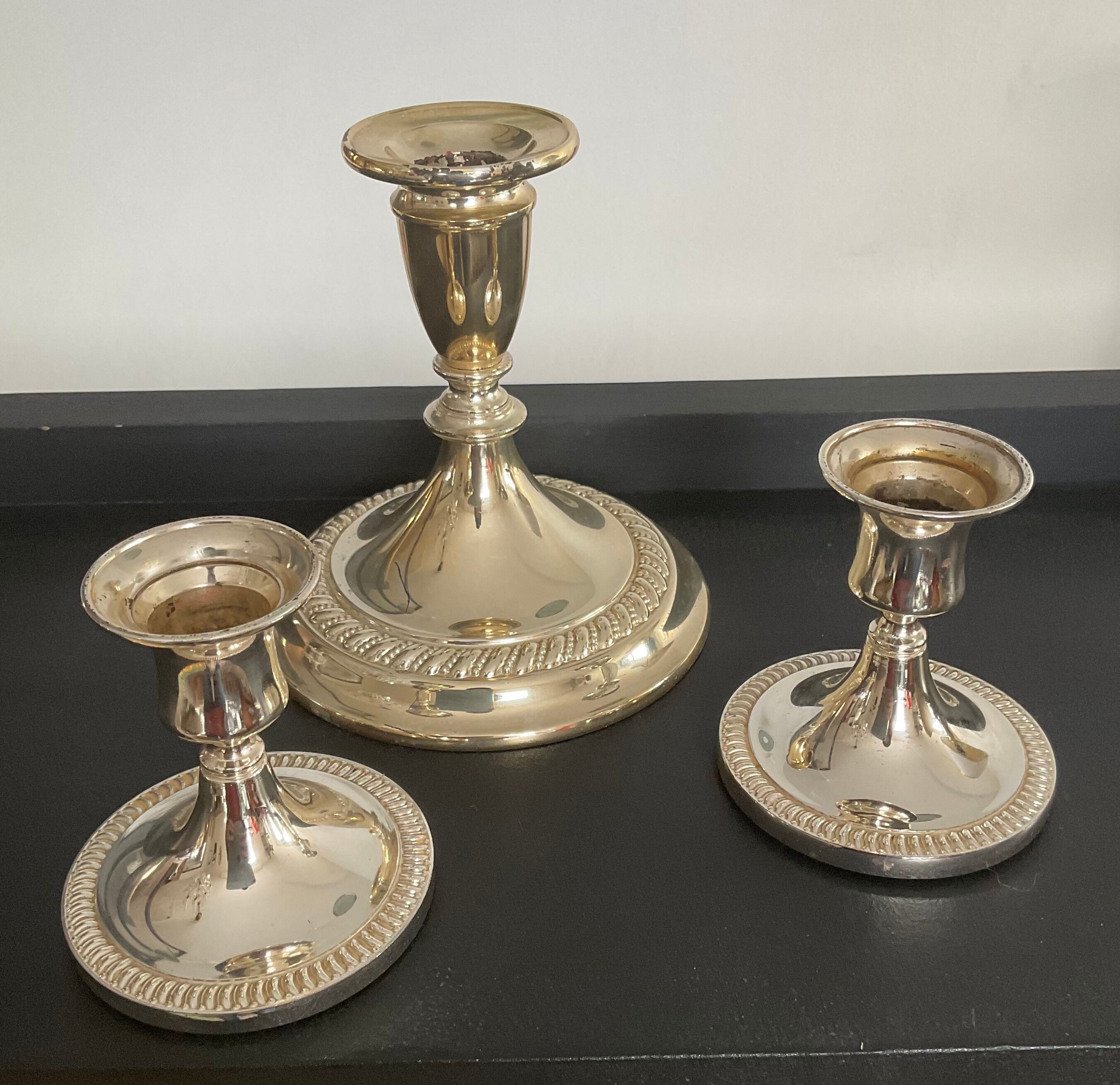 Series of 3 vintage candle holders in silver metal 70s