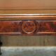 Partner desk with two carved columns featuring lion heads, according to Thomas Chippendale, restored.