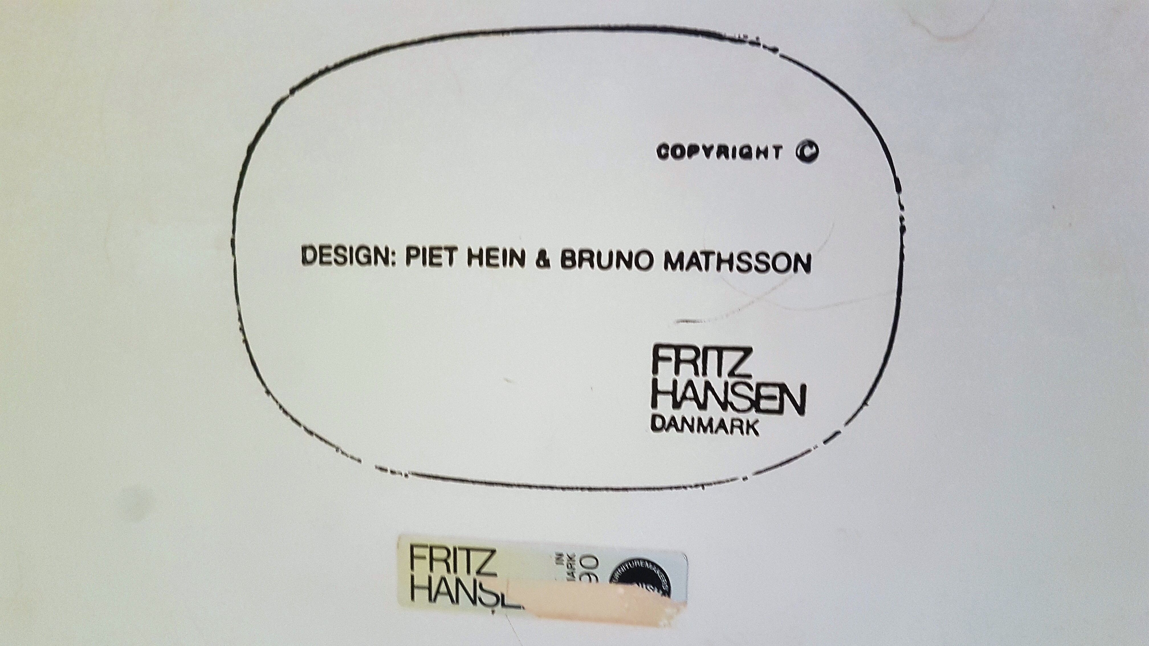 White Super-elliptical table, design by Piet Hein and Bruno Mathsson for Fritz Hansen