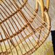 Vintage adult rattan armchair from the 1960s.