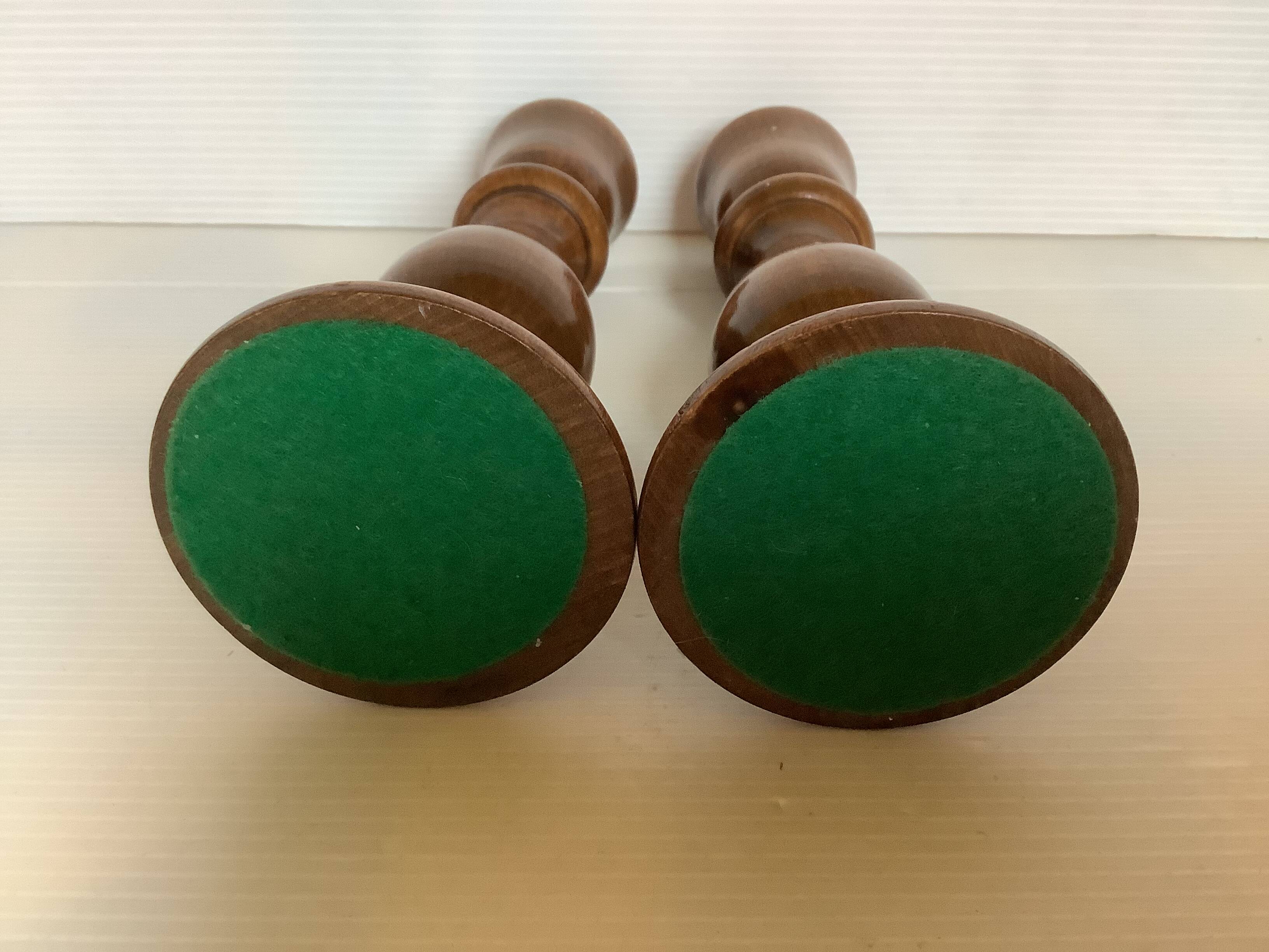 Pair of varnished wooden candlesticks