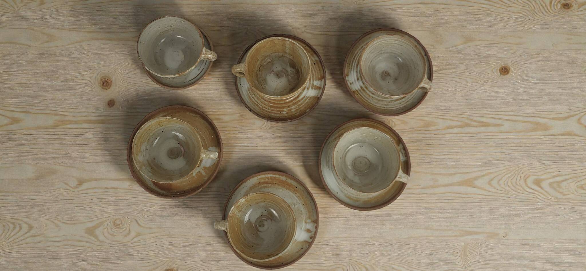 6 stoneware cups and saucers by Pierre Lion