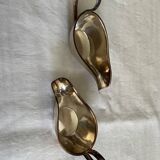 Set of two silver metal saucepans