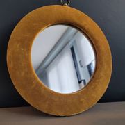 Vintage mirror with mustard velvet frame