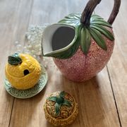 Set of ceramic fruits, a strawberry decanter and two lemon and pineapple jam jars