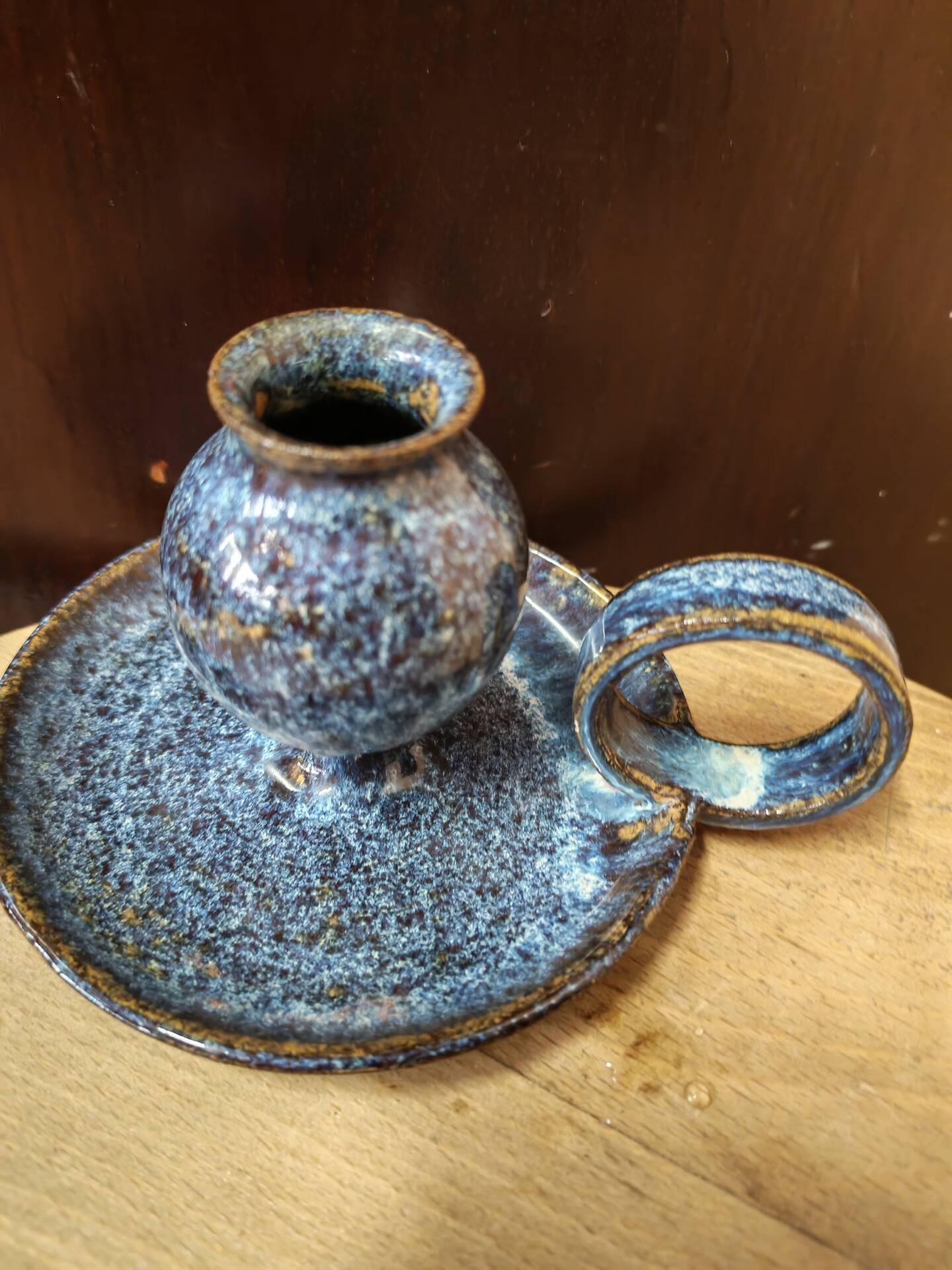 Pair of speckled glazed ceramic candle holders rat of the cellar