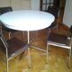 Round dining table with vintage chromed base 1970/80 years