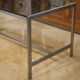 Brushed stainless steel and smoked black glass desk from the 1980s.