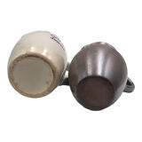 Two pitchers two cups sandstone