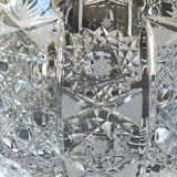 Vintage candy box/Drageoir in finely cut Bohemian crystal. Sophisticated star/brass patterns. Size 20 x 16 cm