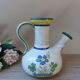 Pichet carafe chevrette in glazed terracotta with flowers, numbered Italian craftsmanship.