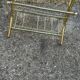 Mid-century modern brass and smoked glass side table with integrated magazine holder, 1970s