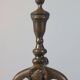 Paire de chenets en laiton au design zoomorphe vintage.