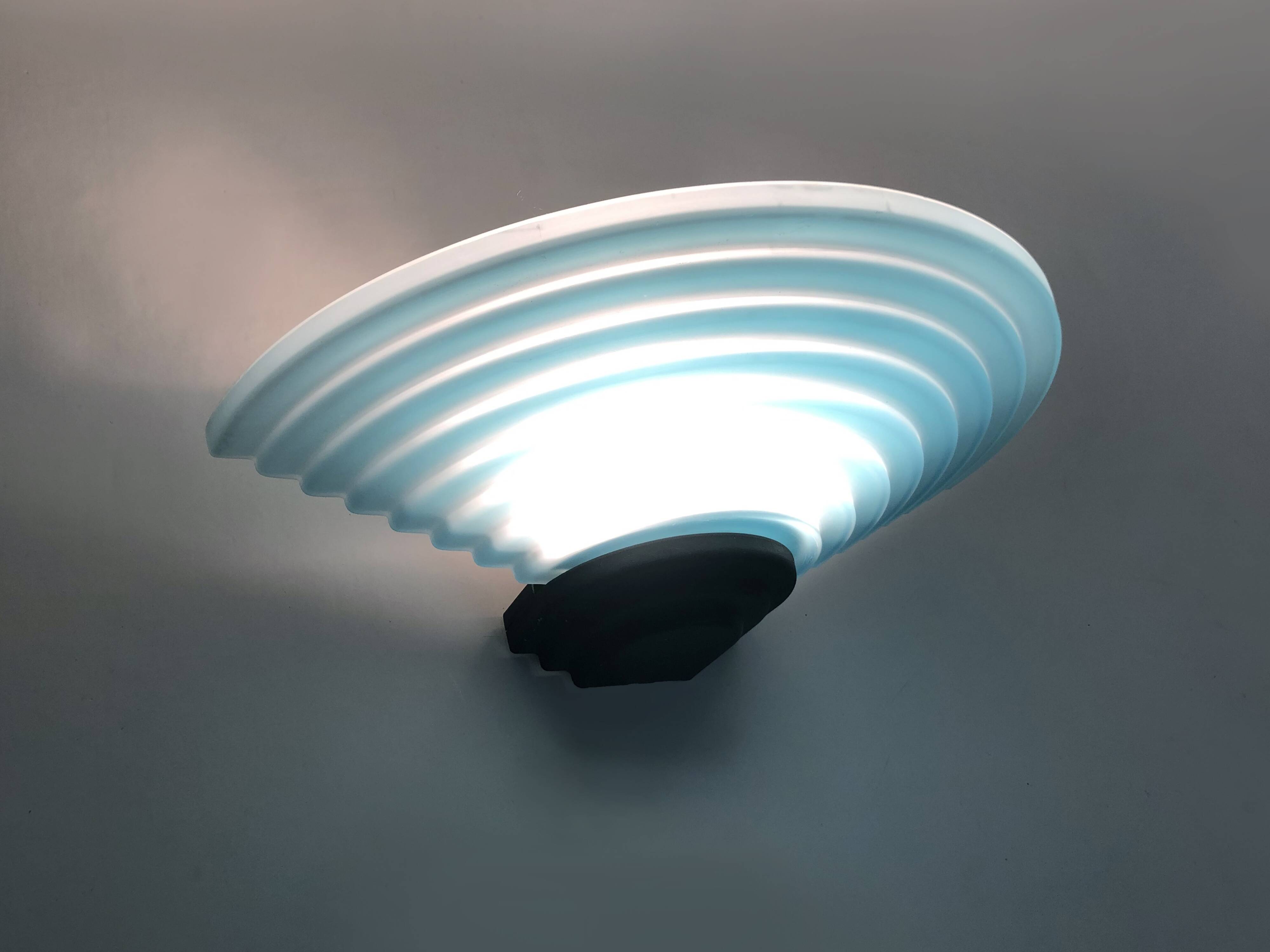 Pair of AV Mazzega wall lights in blue Murano glass. 1980s