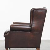 Very beautiful wing chair made of cowhide leather in English style
