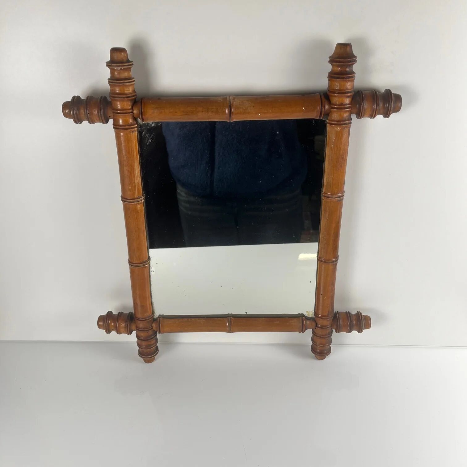 Wooden turned mirror in bamboo style, circa 1900-1930.
