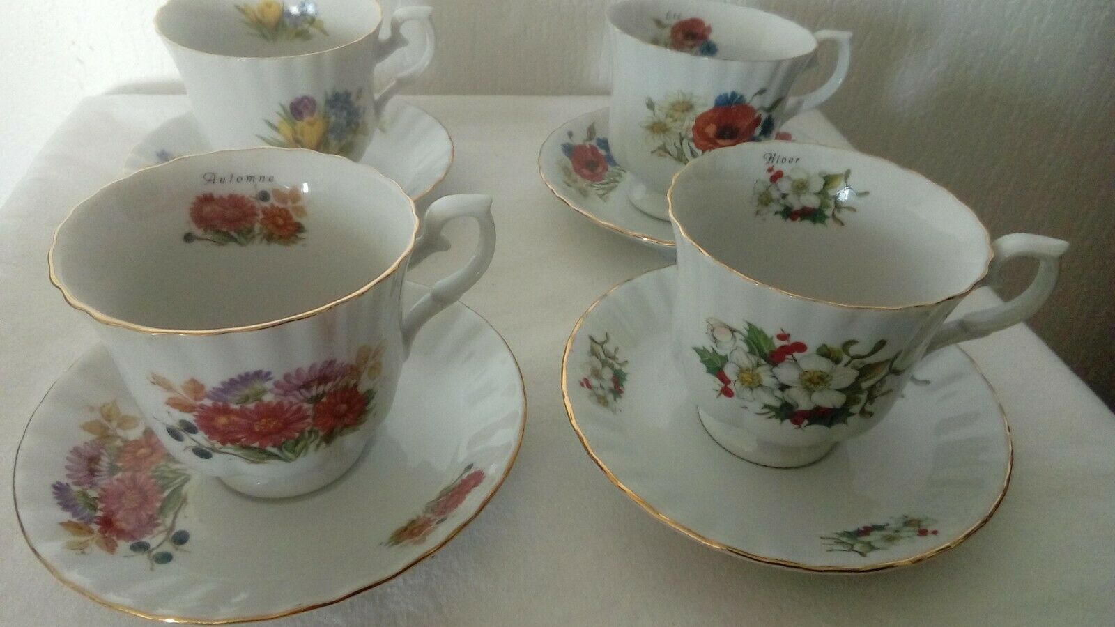 4 porcelain coffee cups on the theme of the 4 seasons
