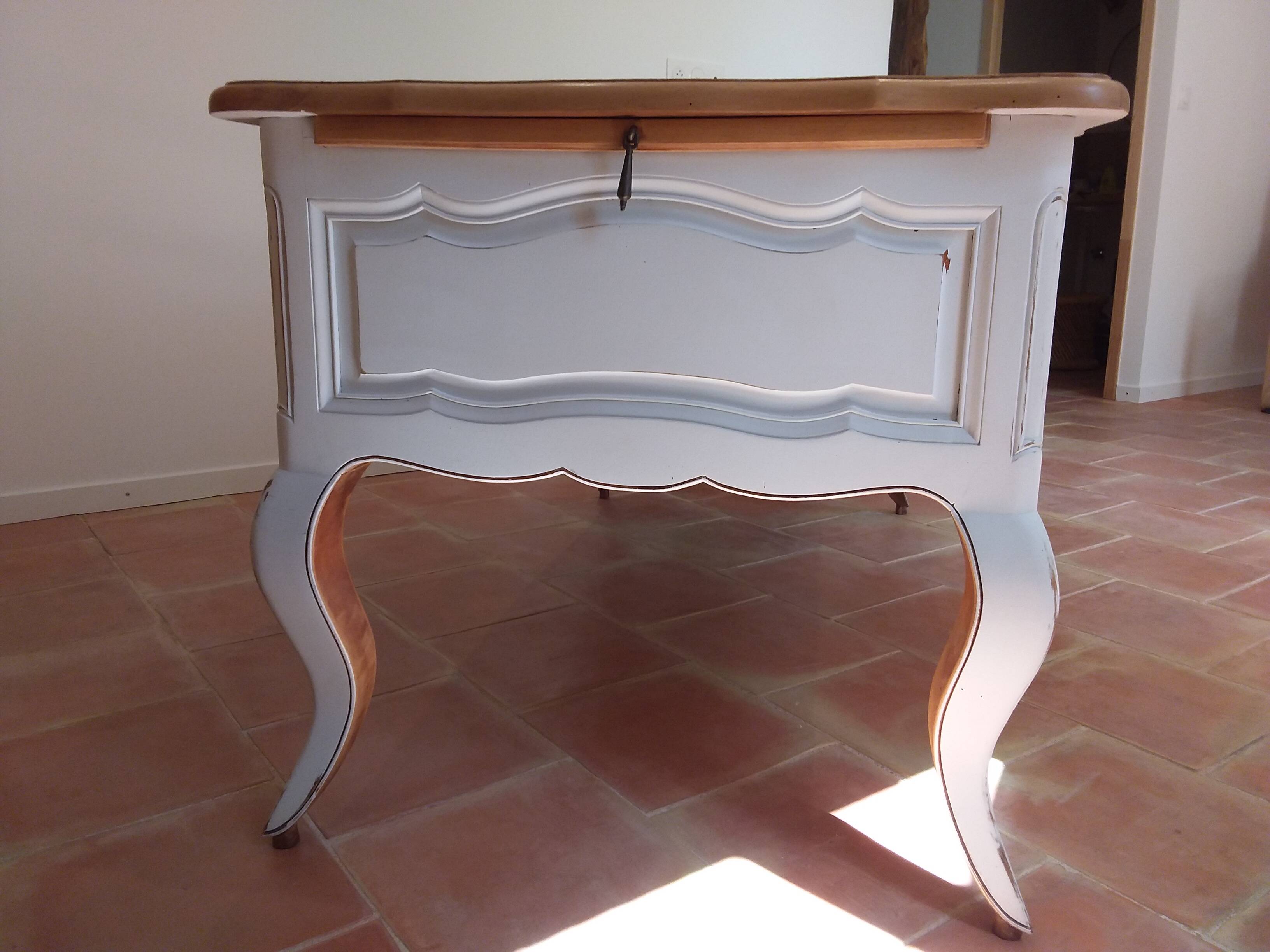 Solid wood desk with distressed white paint.