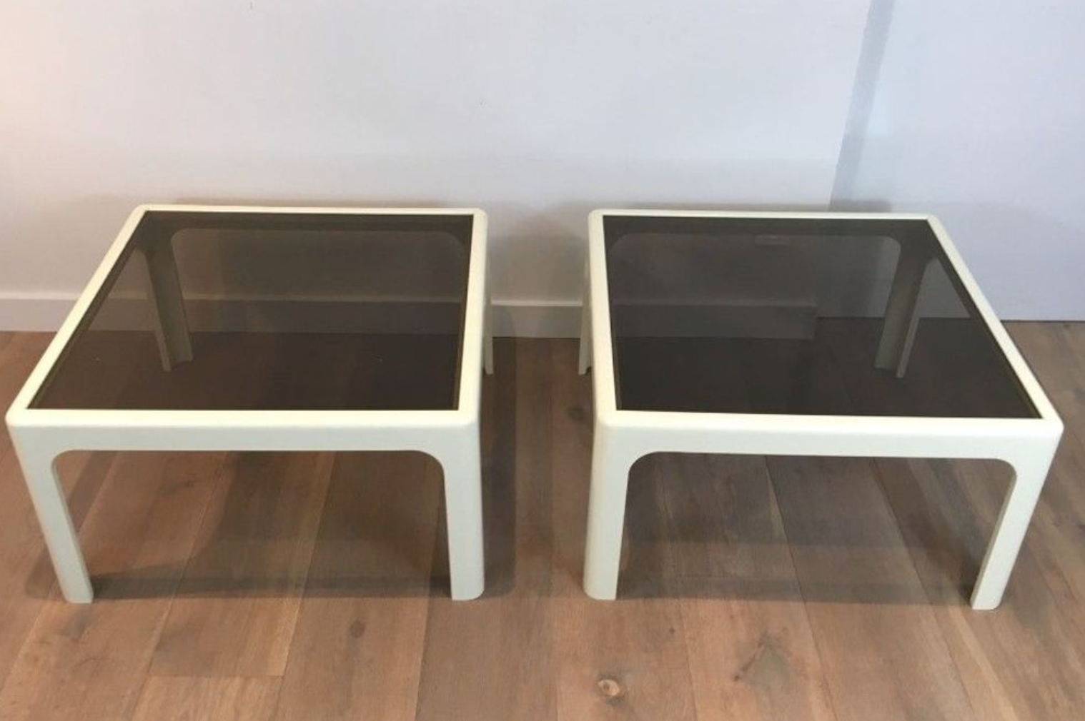 Pair of white lacquered fiberglass sofa ends