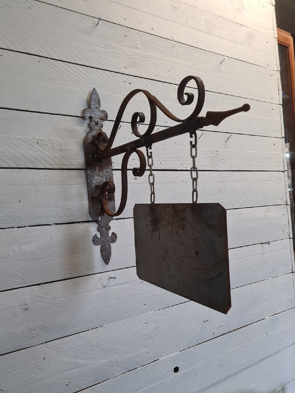 Wrought iron trade sign