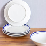 4 blue bordered dessert plates and a matching bowl