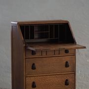 Desk / Chest of drawers in modern Danish oak from the early 20th century with shell handles.