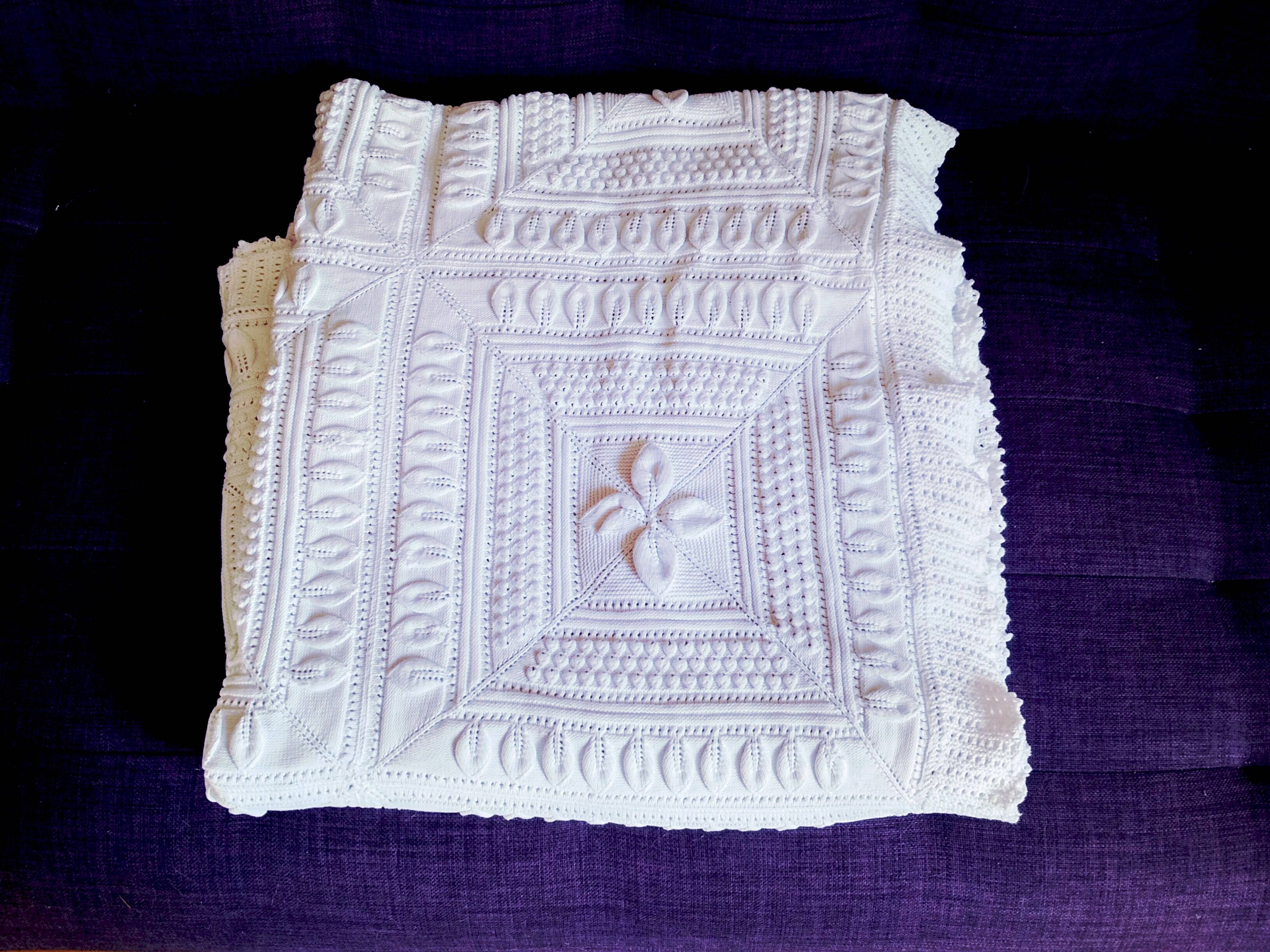 Knitted white cotton bedspread