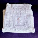 Knitted white cotton bedspread