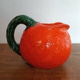 Orange pitcher in Corsican slip