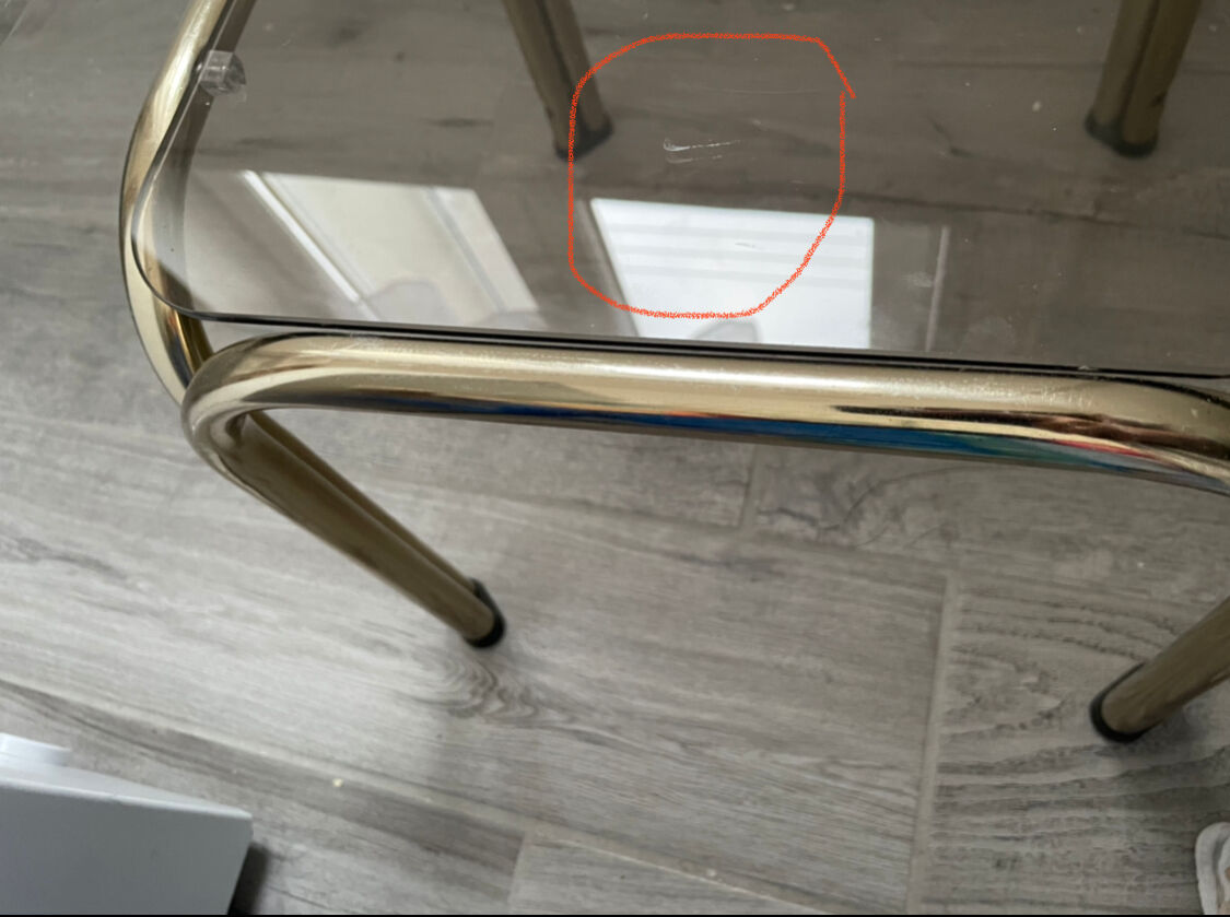 Pull-out tables in vintage smoked glass