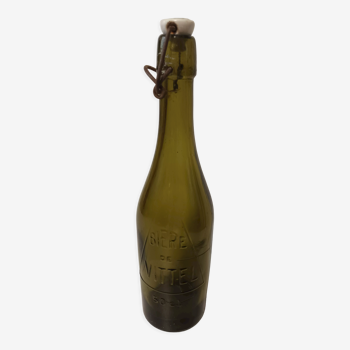 Glass bottle of vittel beer