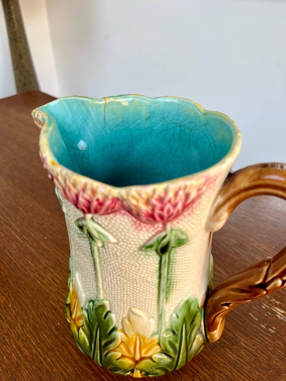 Antique floral barbotine jug – late 19th century ceramic