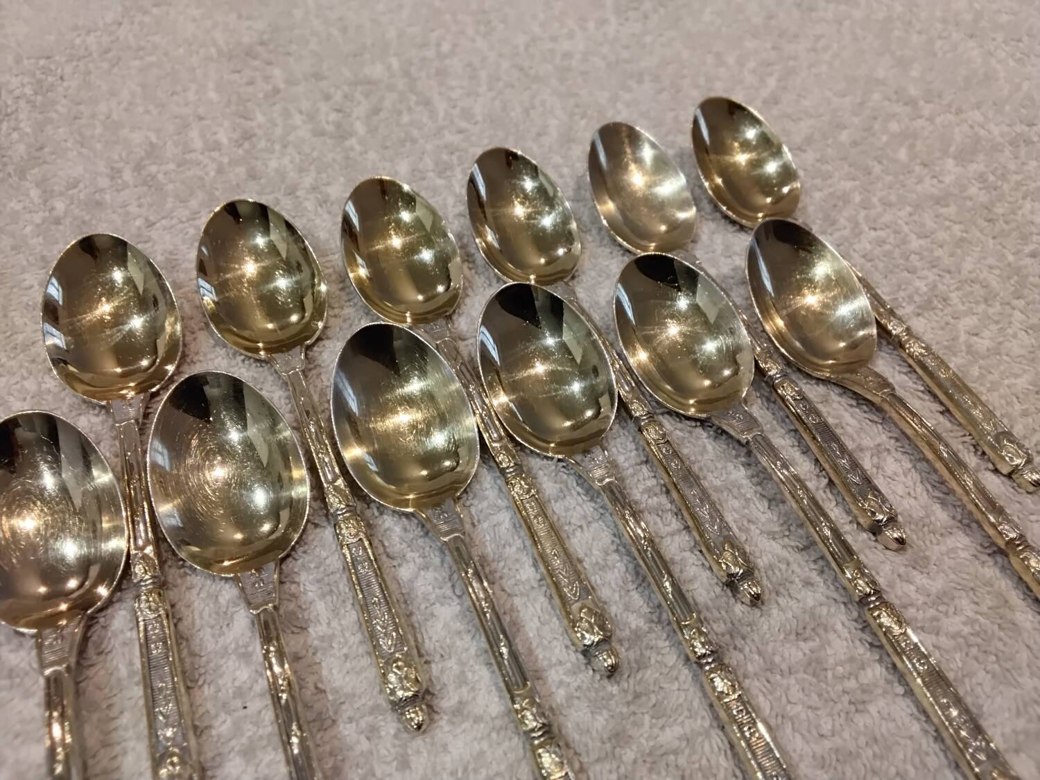 12 gold-plated metal moka spoons with Russian-style handles, 10.6 cm