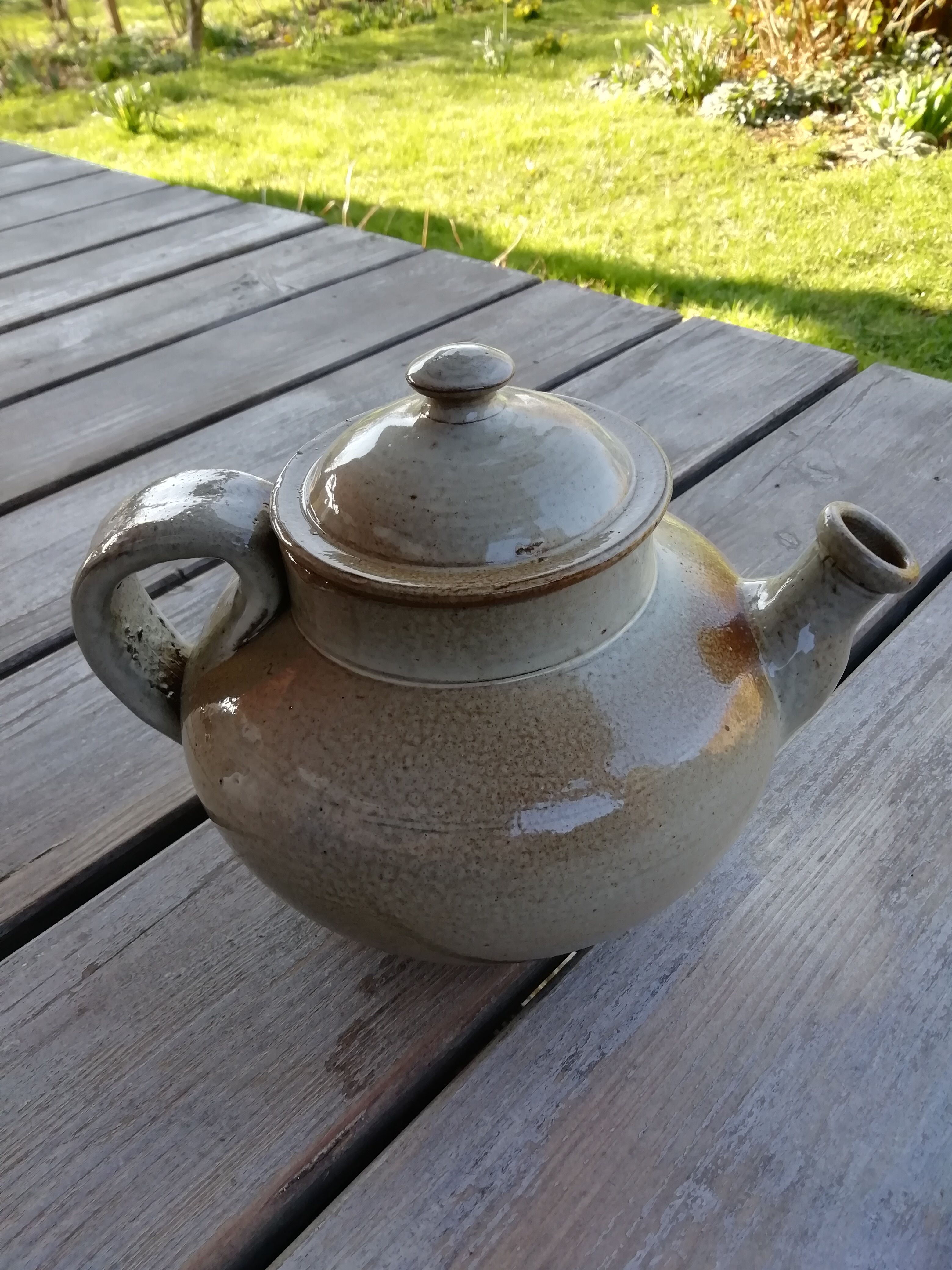 Trio of artisan sandstone teapots