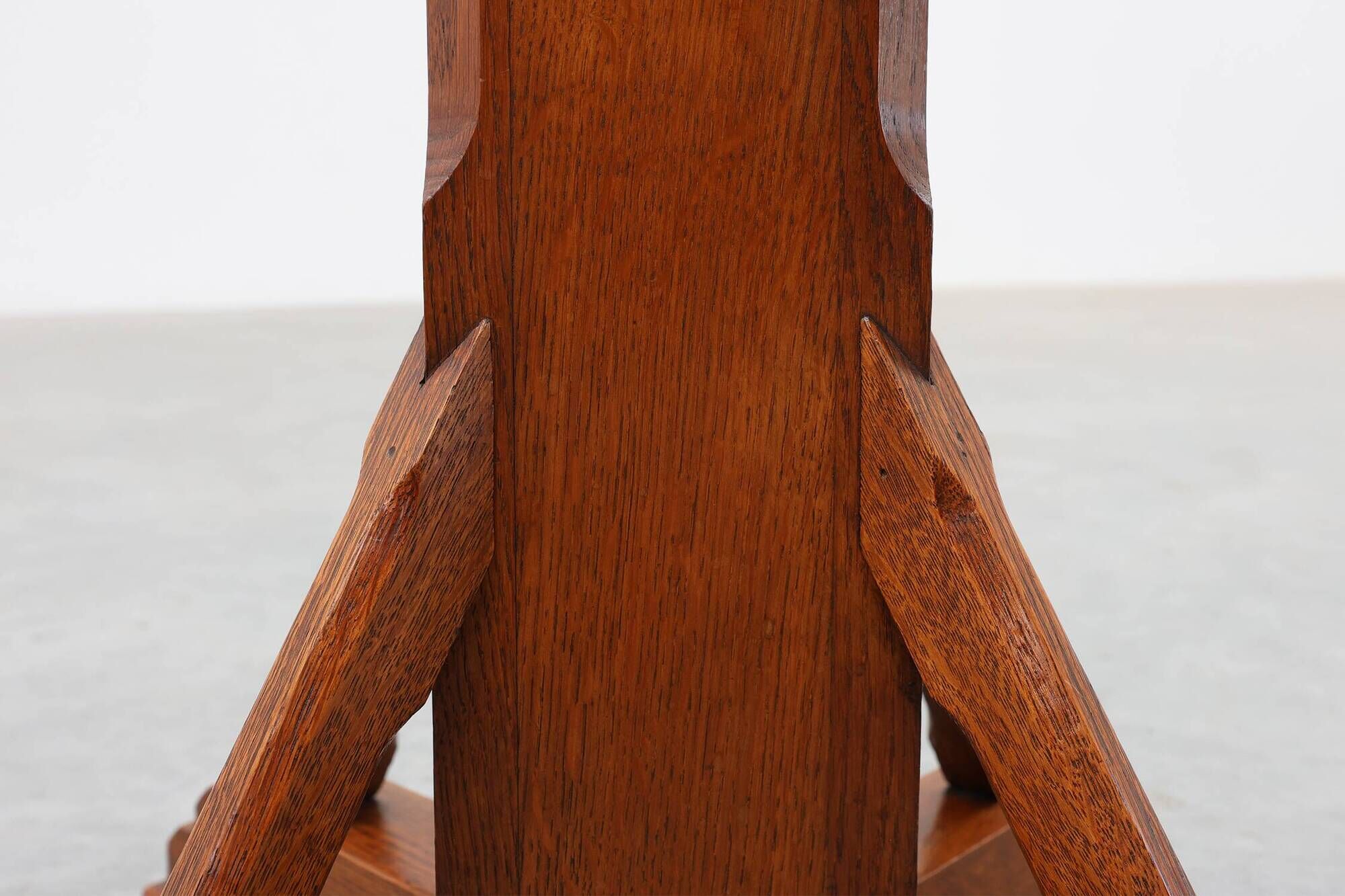 Art Deco oak pedestal with pierced brackets and cross base, Belgium 1920s